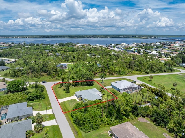 aerial view featuring a water view and a residential view