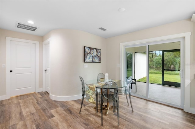 dining room featuring light wood-type flooring