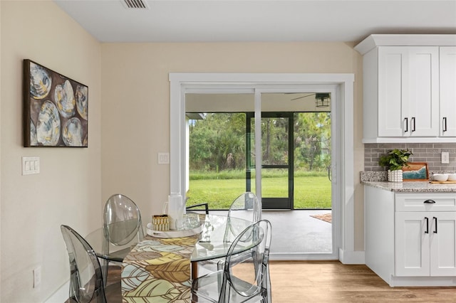 dining area featuring light hardwood / wood-style floors