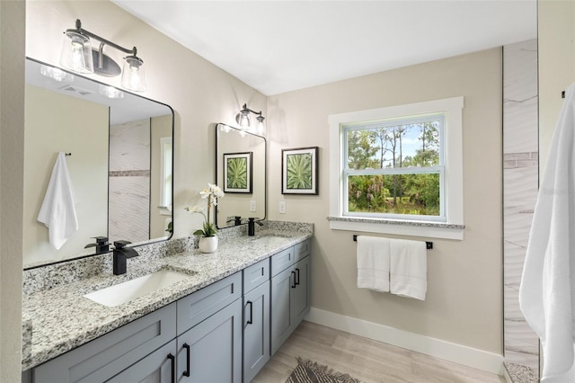 bathroom featuring vanity and wood-type flooring