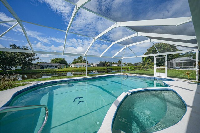 view of pool with glass enclosure and a lawn