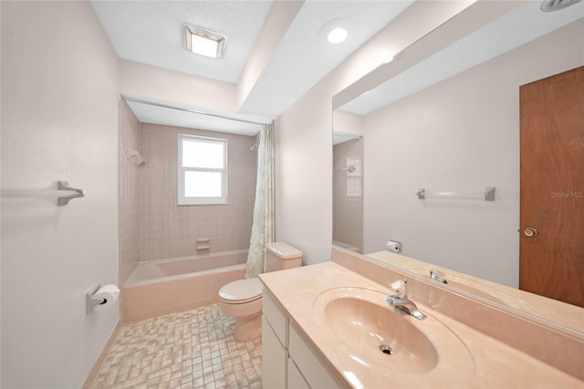 bathroom featuring vanity, shower / bath combination with curtain, and toilet