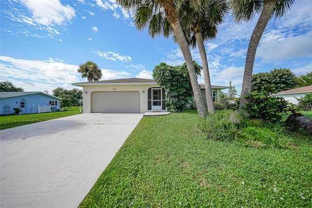 view of front of house with a garage, concrete driveway, a front lawn, and stucco siding