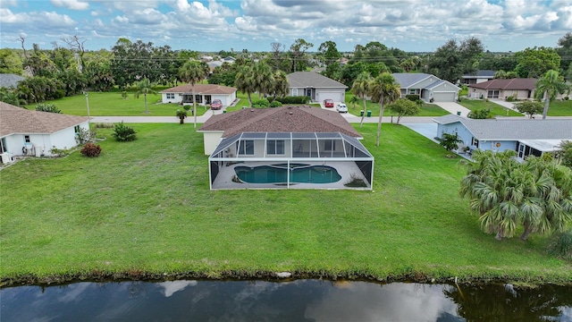 aerial view with a water view and a residential view