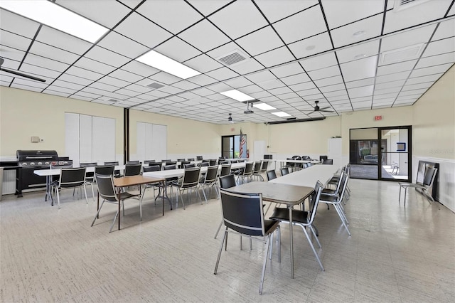 dining space featuring ceiling fan