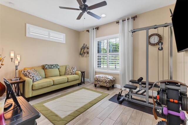191 Brig Cir W, Placida, FL 33946 - exercise room with baseboards, ceiling fan, and wood finished floors
