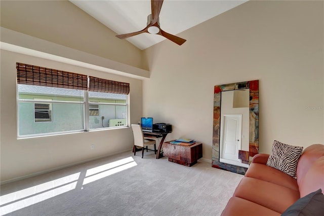 carpeted living room featuring high vaulted ceiling and ceiling fan