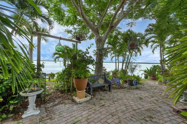 view of patio featuring a water view