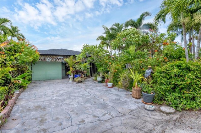 view of patio featuring a garage