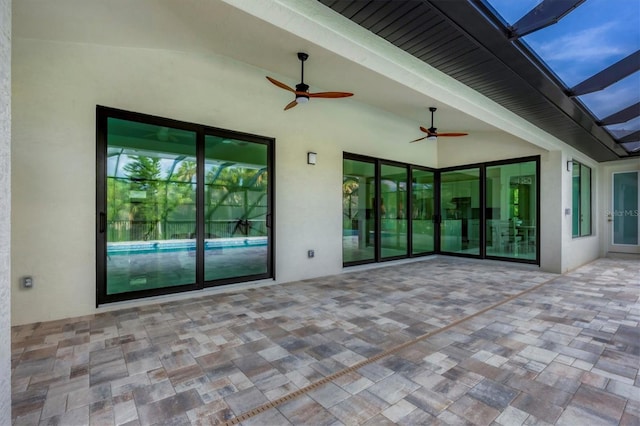 view of patio featuring ceiling fan