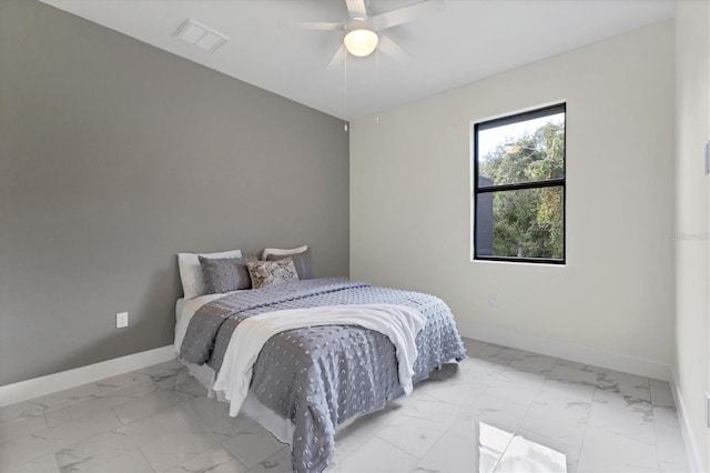 bedroom featuring marble finish floor, visible vents, baseboards, and ceiling fan