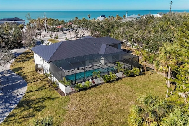 drone / aerial view with a water view