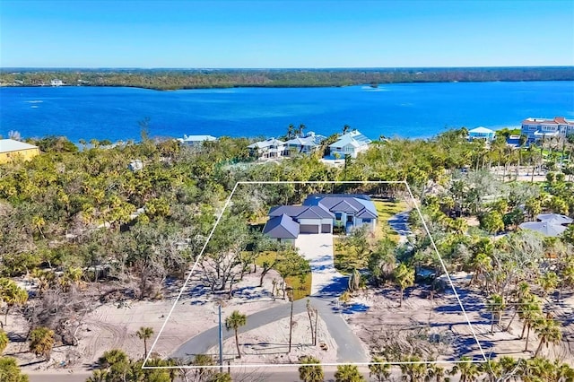 drone / aerial view featuring a water view