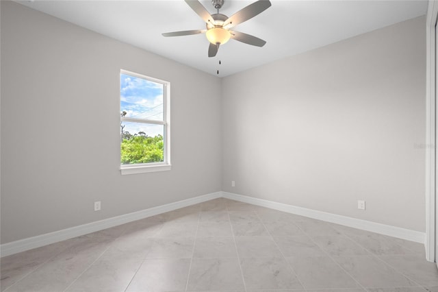 unfurnished room with ceiling fan