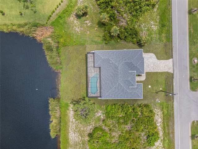 birds eye view of property featuring a water view