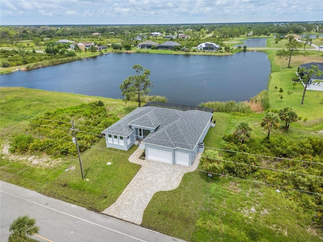 birds eye view of property featuring a water view