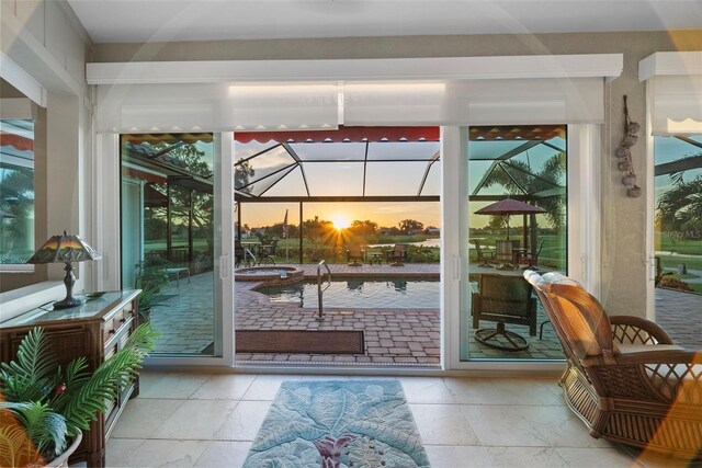 entryway featuring plenty of natural light and light tile patterned floors