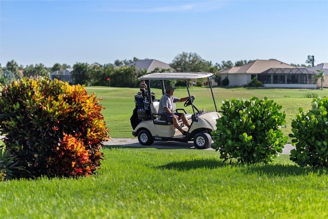 view of community featuring a yard