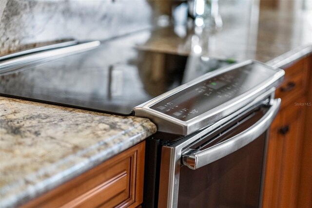 interior details featuring light stone countertops