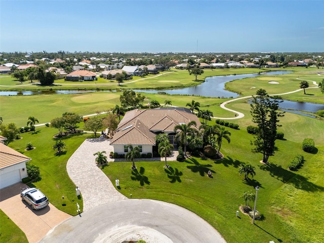 birds eye view of property featuring a water view and golf course view