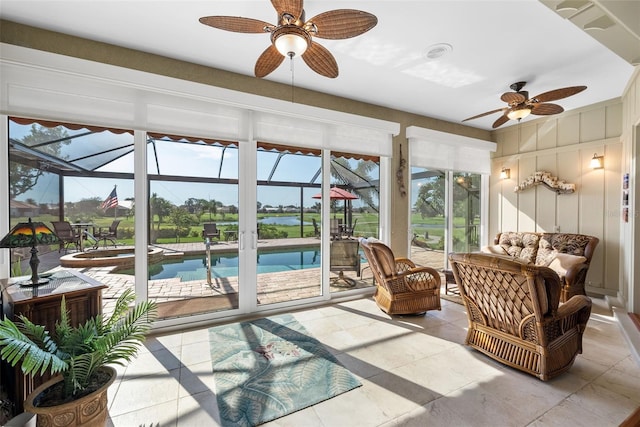 sunroom / solarium with ceiling fan