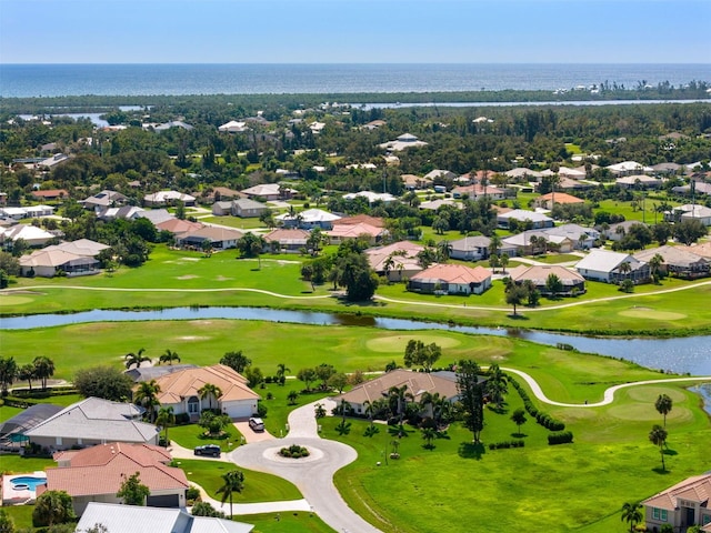 birds eye view of property with a residential view, view of golf course, and a water view