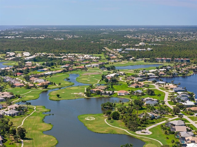 bird's eye view with golf course view, a water view, and a residential view