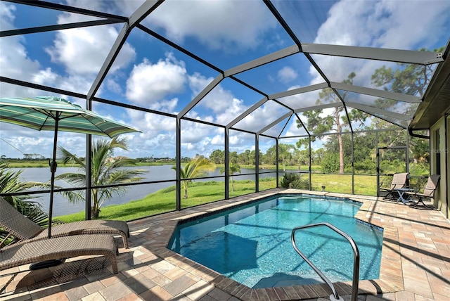 outdoor pool with a patio, a lawn, a water view, and a lanai