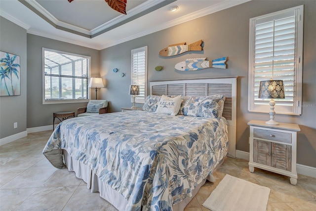 bedroom featuring light tile patterned floors, baseboards, a raised ceiling, and crown molding