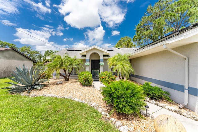 view of front of property with a front yard