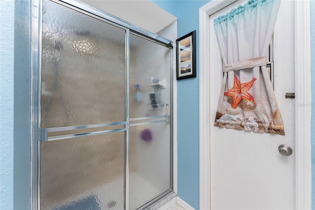 bathroom with an enclosed shower