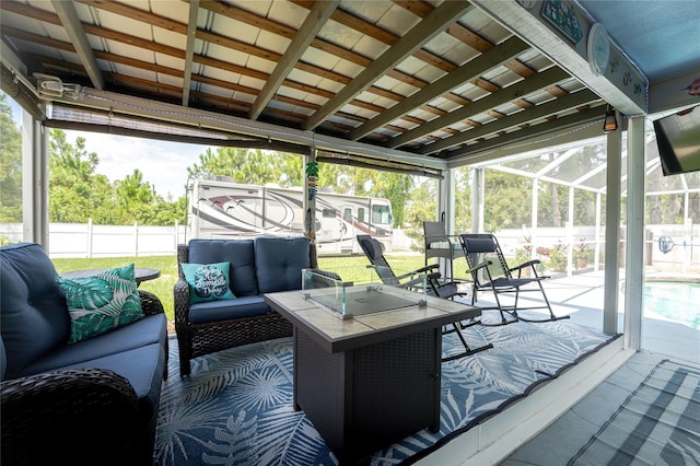 sunroom / solarium featuring plenty of natural light