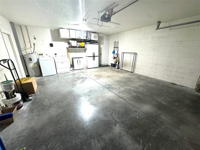 garage with a garage door opener, water heater, separate washer and dryer, and white refrigerator