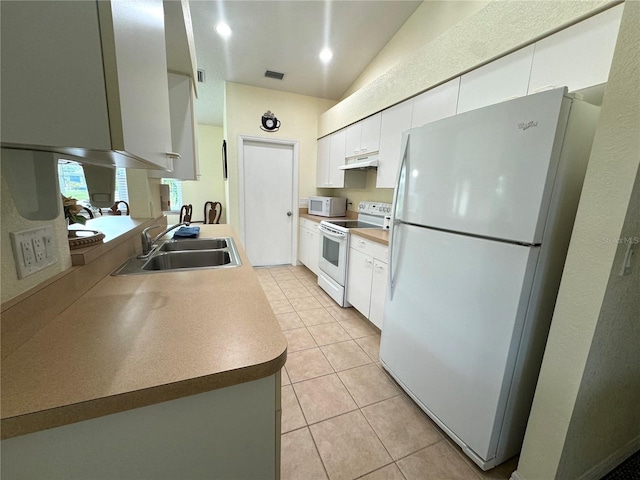 kitchen featuring white appliances, visible vents, light tile patterned flooring, a sink, and under cabinet range hood