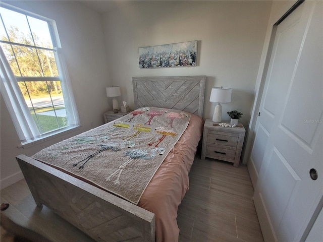 bedroom with light hardwood / wood-style floors