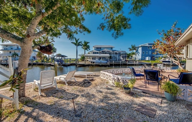 dock area with a water view