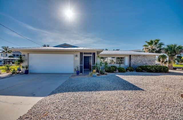 ranch-style home with a garage