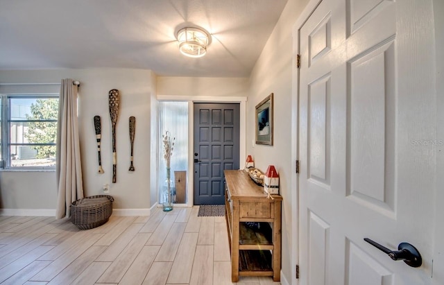 entryway with light hardwood / wood-style flooring