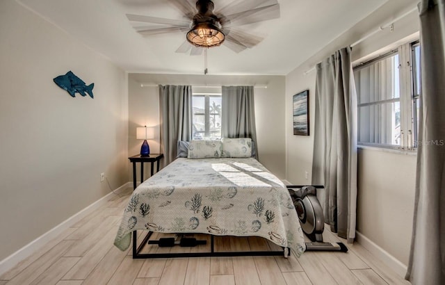 bedroom featuring ceiling fan and light wood-type flooring