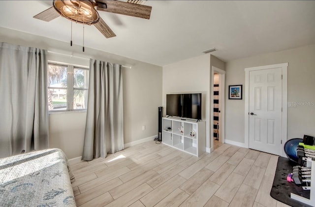 interior space featuring light wood-type flooring and ceiling fan