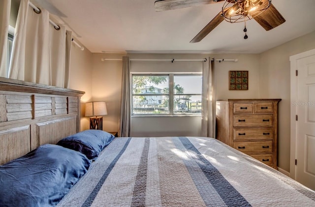 bedroom featuring ceiling fan