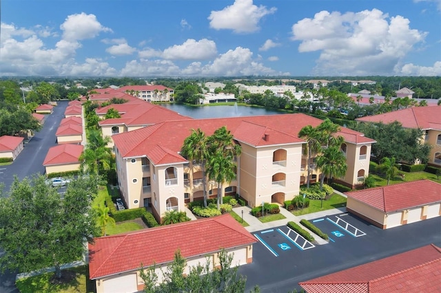 bird's eye view with a water view