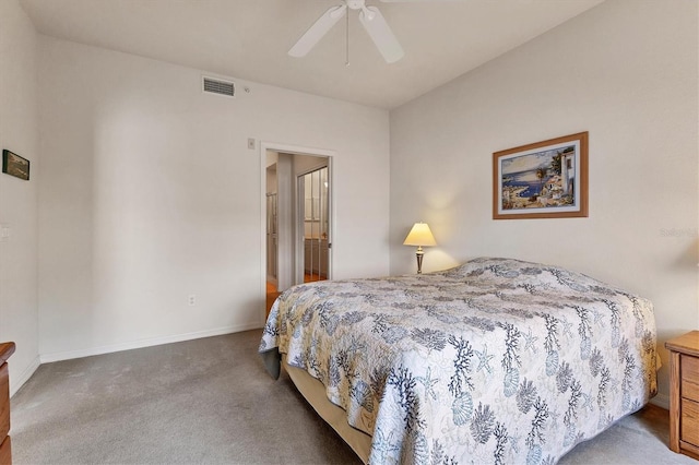 bedroom with carpet, visible vents, baseboards, and ceiling fan