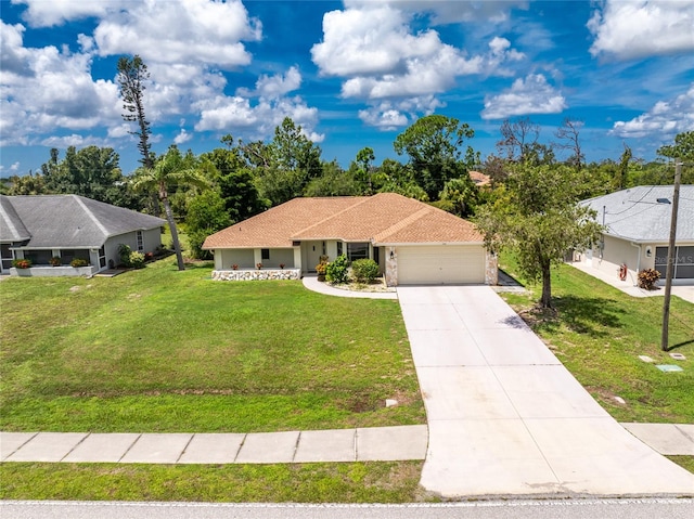 view of front of house with a front lawn and a garage