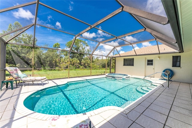 view of swimming pool featuring glass enclosure, a patio area, and a pool with connected hot tub