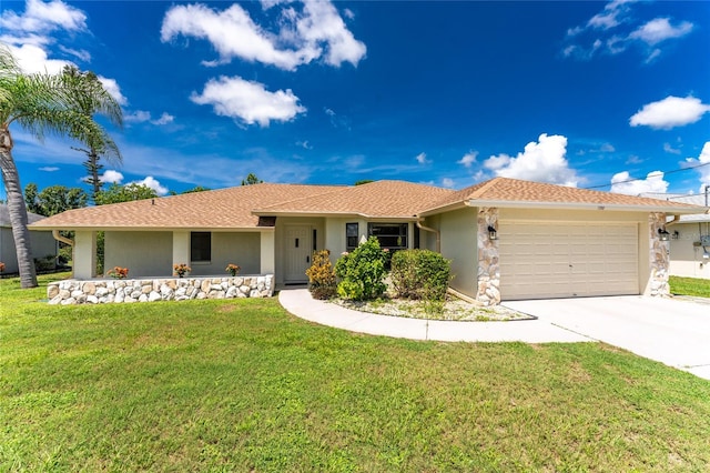 ranch-style house with a garage, concrete driveway, a front yard, and stucco siding