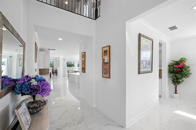 hallway with crown molding