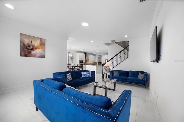 living room featuring crown molding