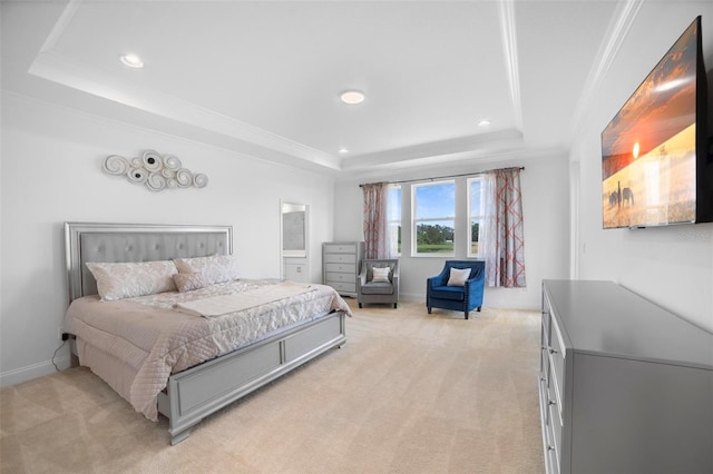 bedroom featuring light carpet, a raised ceiling, and crown molding