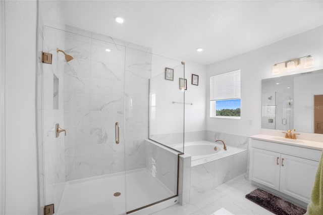 bathroom featuring vanity and plus walk in shower